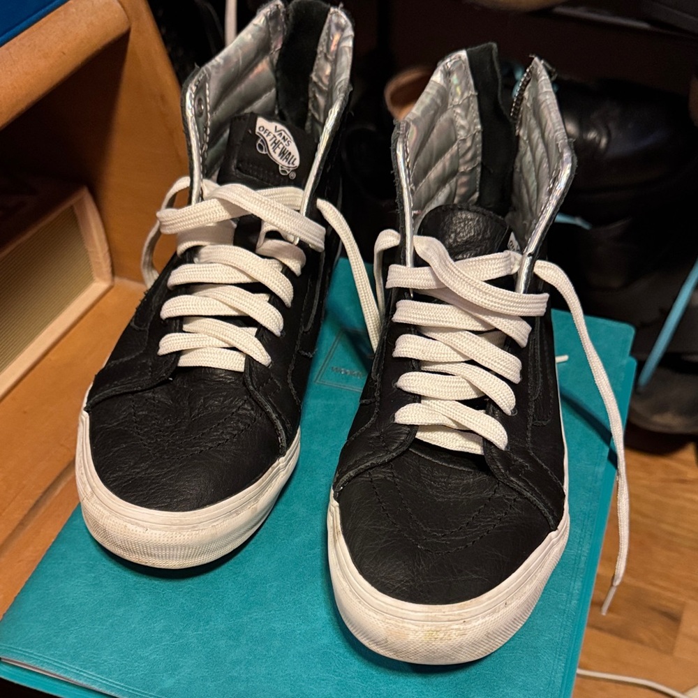 Black High-Top Vans with White Laces